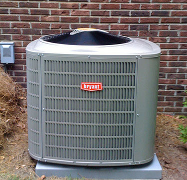 Bryant air conditioning condenser before coolant recharge in Patterson, California