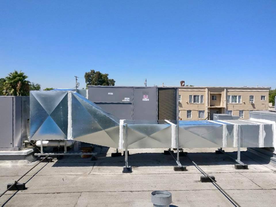 rooftop commercial packaged HVAC system and square ductwork in Lathrop, California